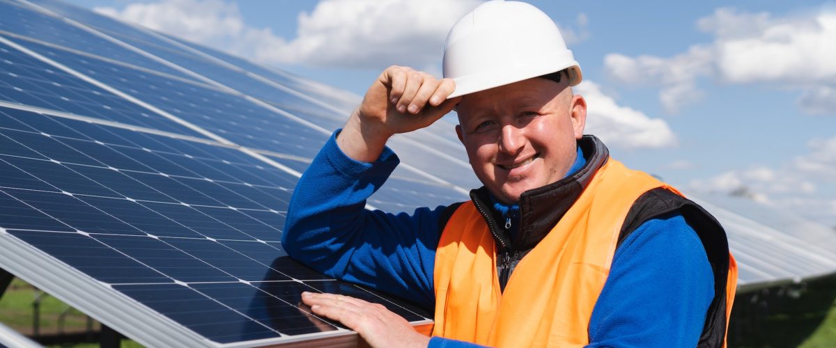 portrait-of-a-worker-in-hard-hat-at-a-solar-power-plant.jpg